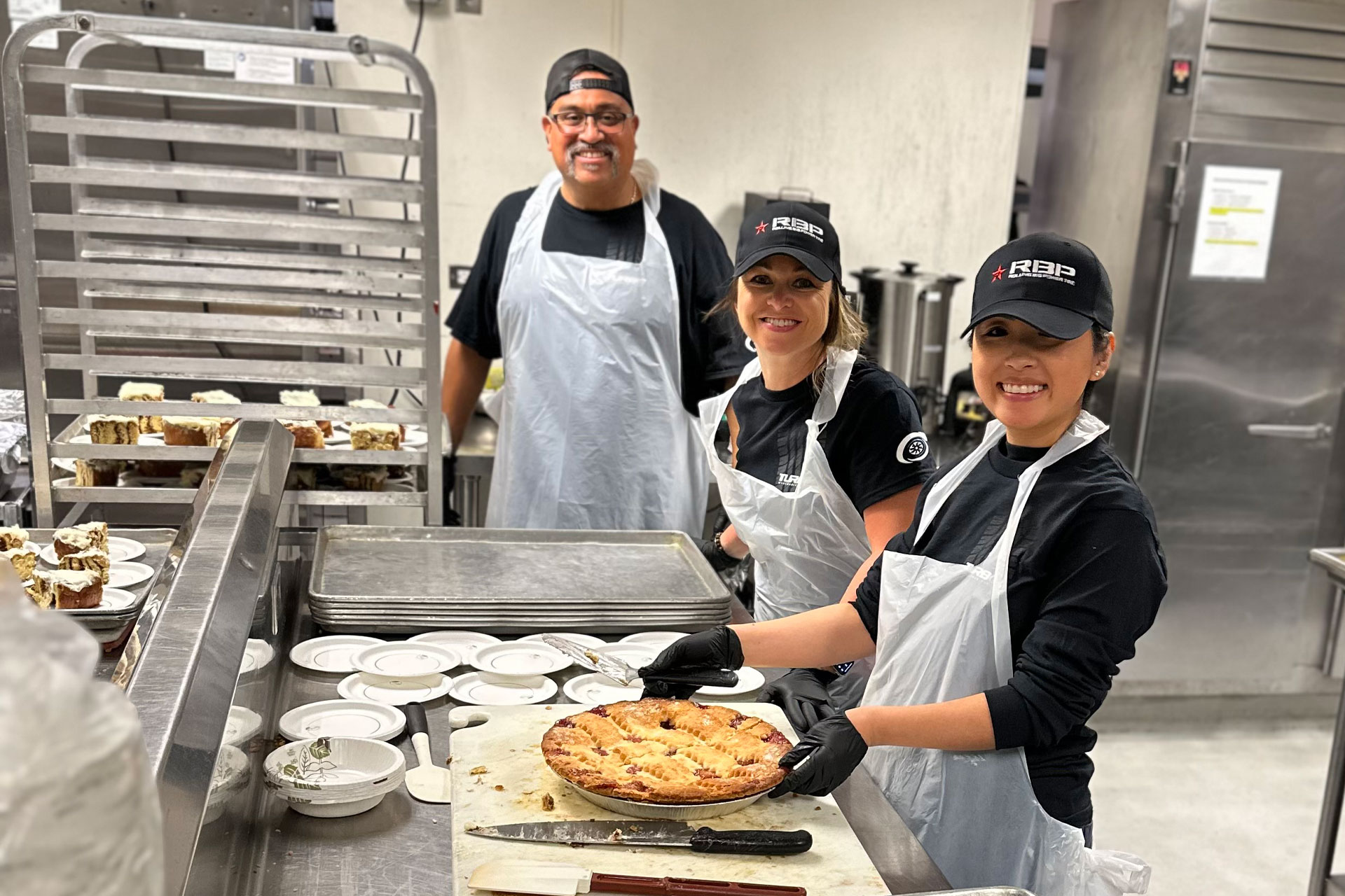 turbo team members participating in community service team building event
