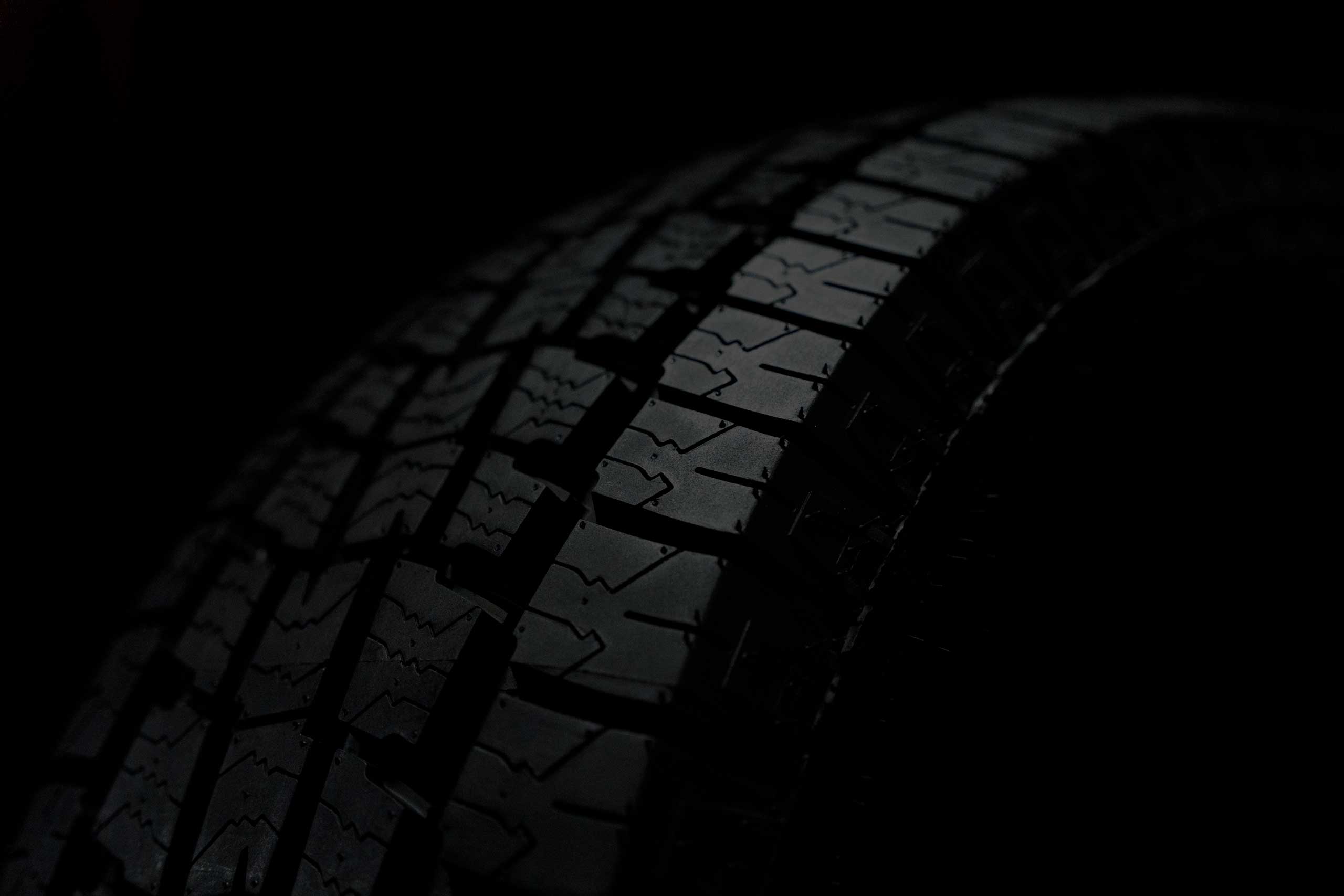 dramatic studio shot of tread detail on lionhart all terrain tire